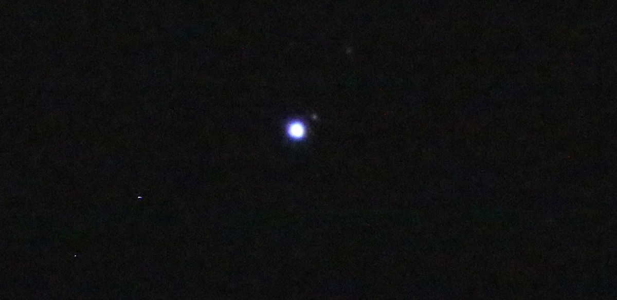 Planet Neptune in a telescope