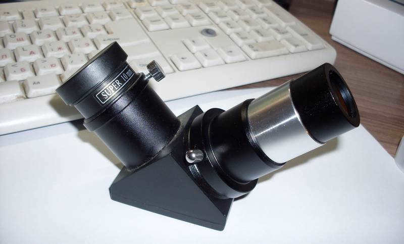 Barlow lens in the body in front of the diagonal mirror. 4x magnification.