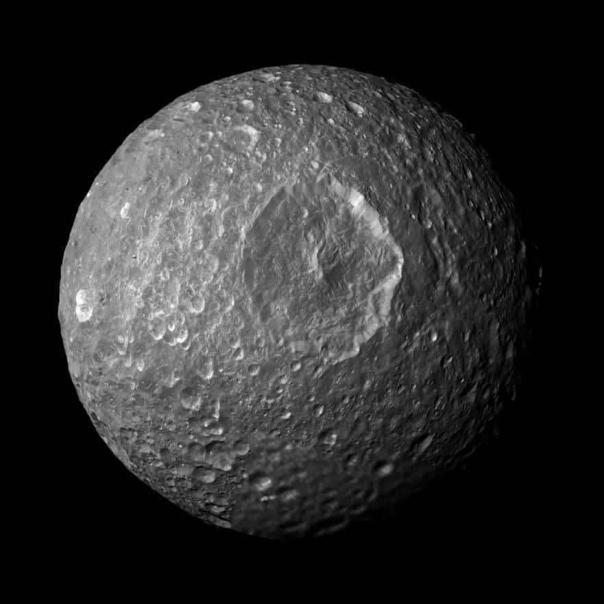 An image of Mimas formed by Cassini images. In the center is the Herschel crater