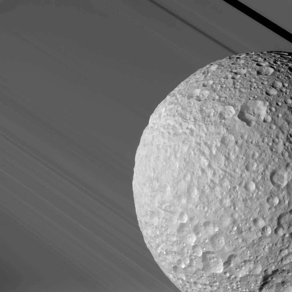 Mimas passes in front of Saturn's rings