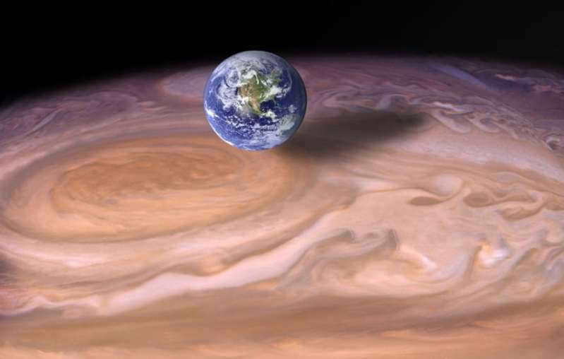 what is a big red spot and what planet is it associated with?