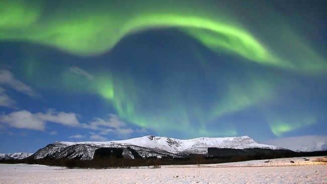 Northern Lights occurs when solar particles collide with the density of the Earth's atmosphere.