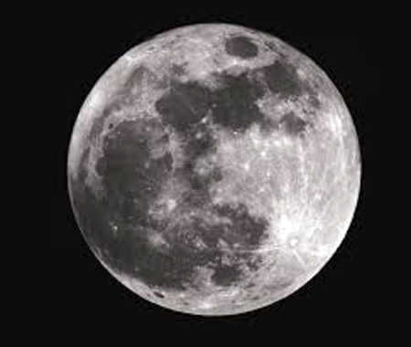 The dark spots on the Moon are craters