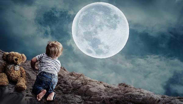 a baby, a bear and the moon