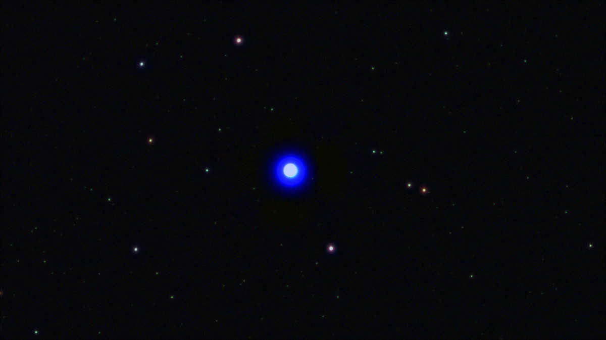 A star in a refractor telescope.
