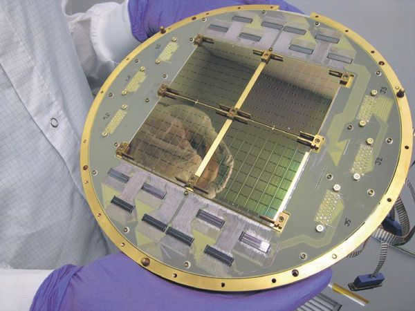 Focal plane of the BICEP2 radio telescope, consisting of 512 superconducting microwave detectors designed and fabricated at NASA's Jet Propulsion Laboratory. NASA/JPL-Caltech photo from www.jp l.nasa.gov website