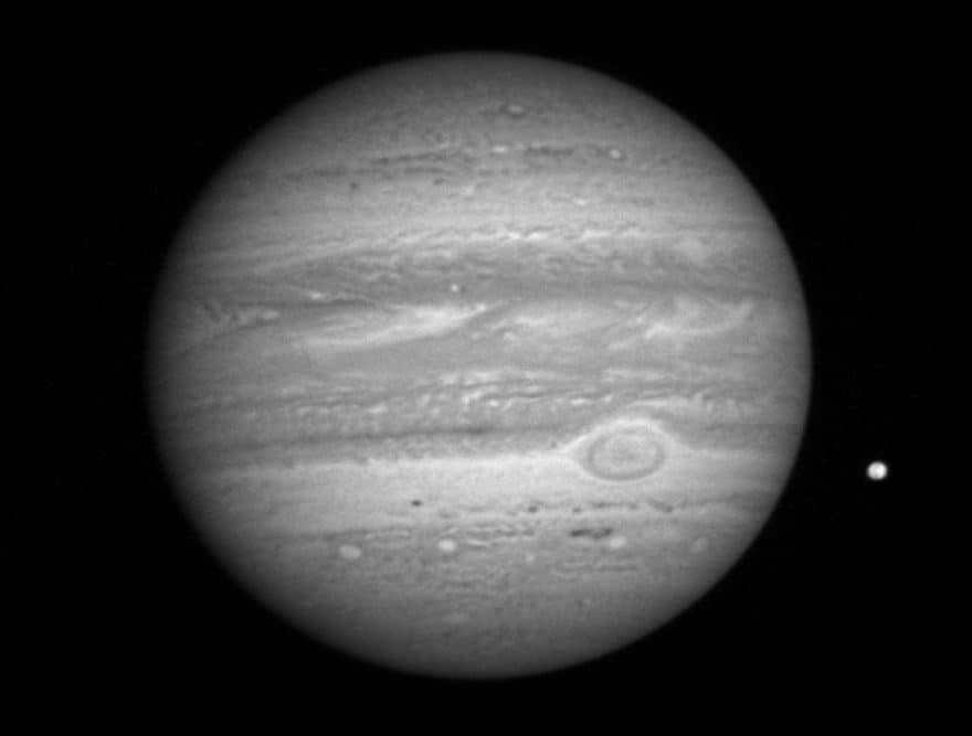 A black-and-white shot of Jupiter captured by the LORRI instrument in 2007