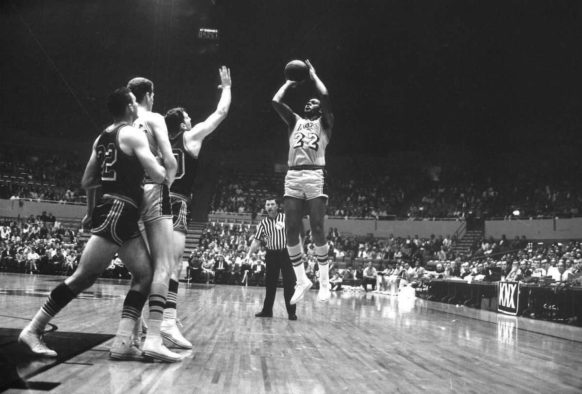 Elgin Baylor makes a shot from the center of the box.